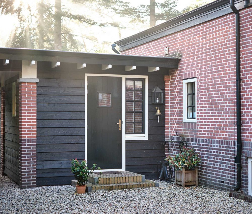 Nieuwe garage en aanbouw woning in Bilthoven